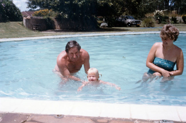 learning to swim at home with mom and dad